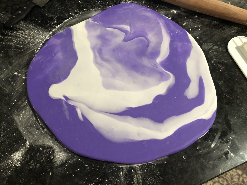 rolling out the fondant